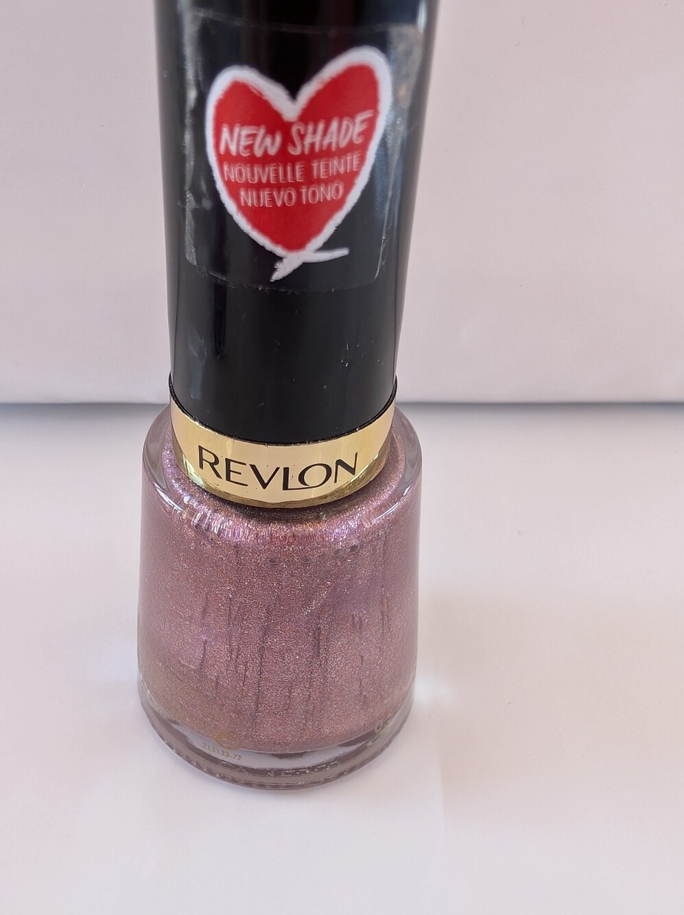 Revlon Shimmery Rose Pink Nail Polish. Color Desirable